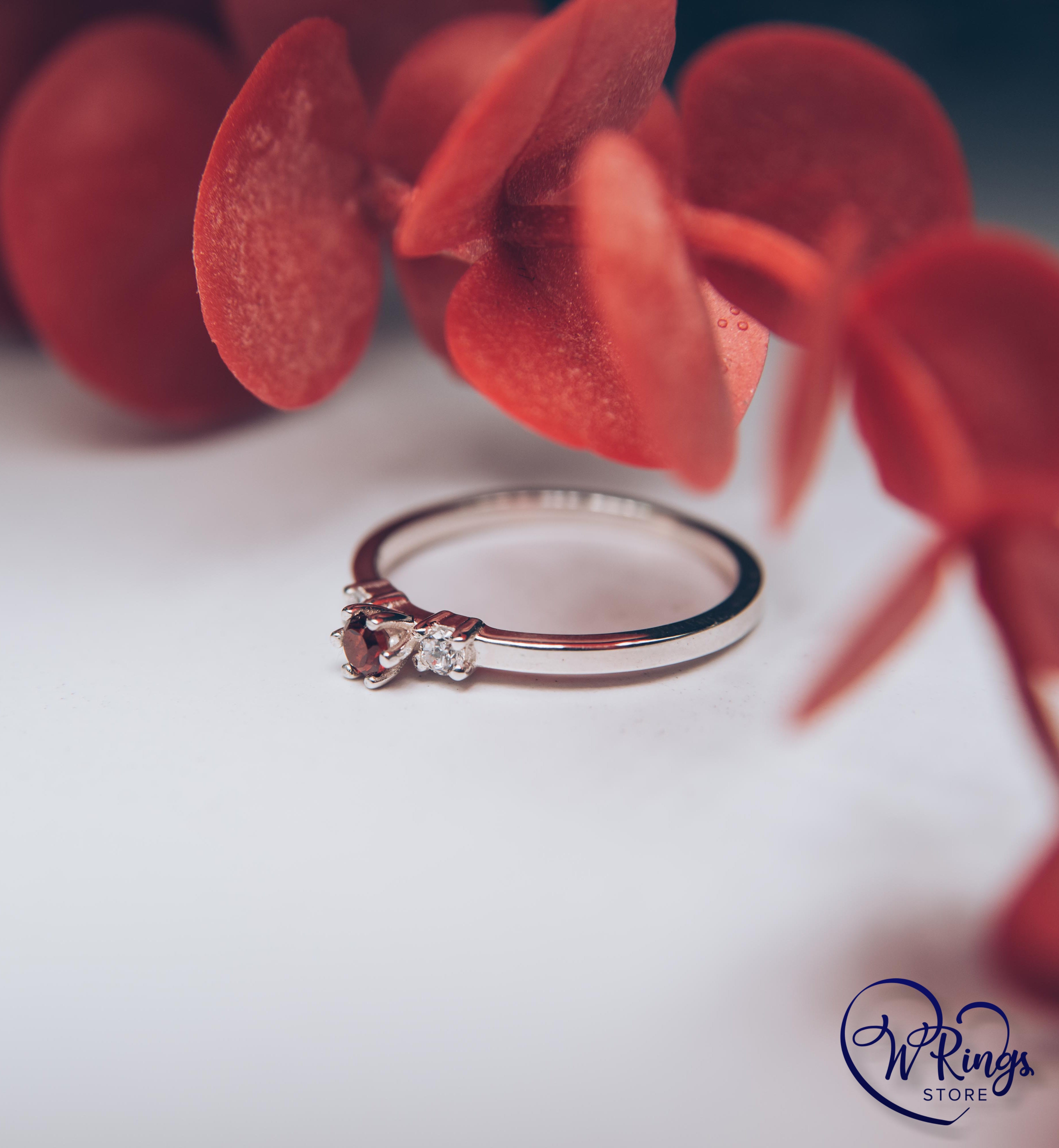 Round Garnet Three Stone Engagement Ring in Silver