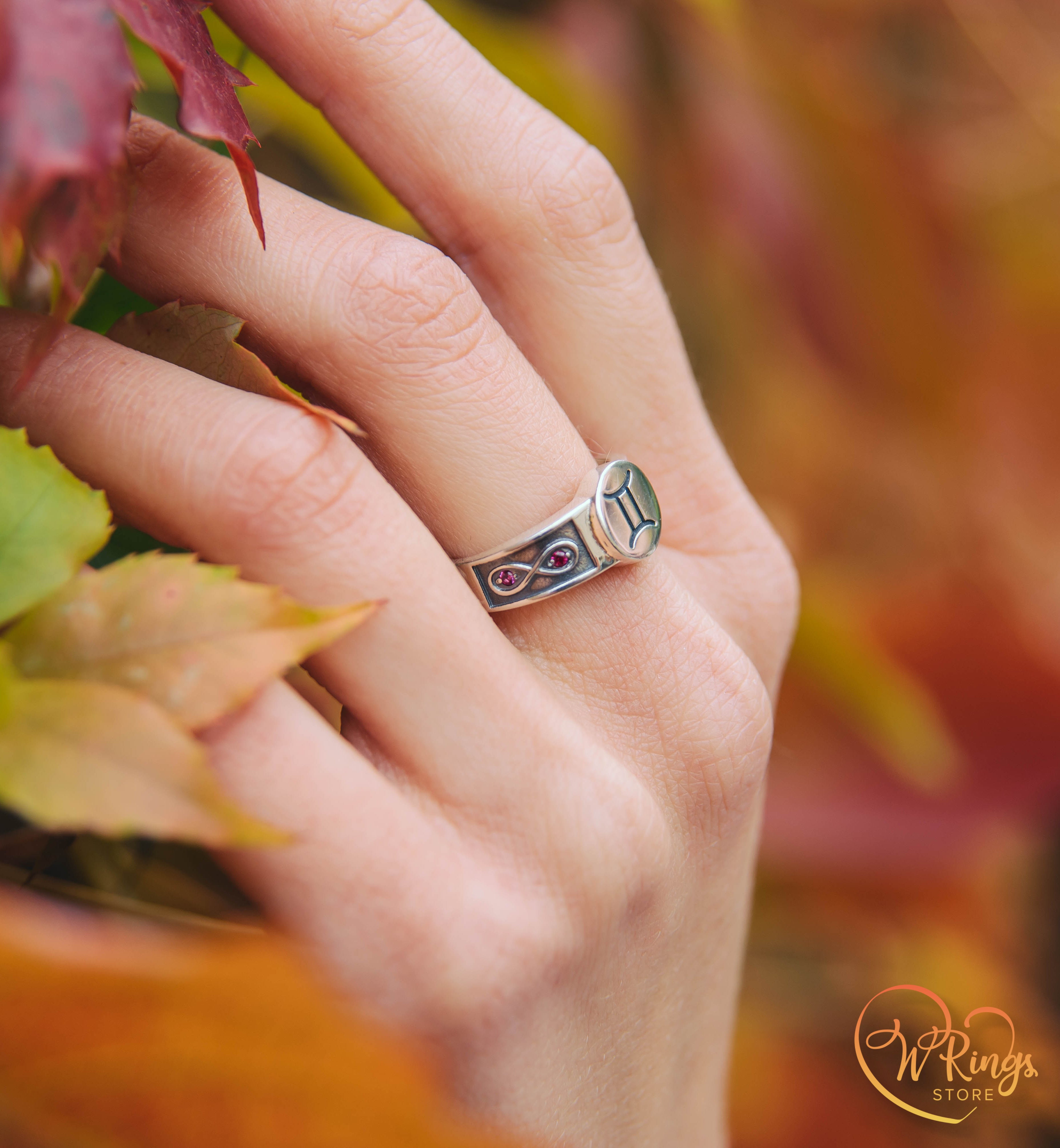 Round shape Gemini Signet Ring with Rubies in side Infinity symbols