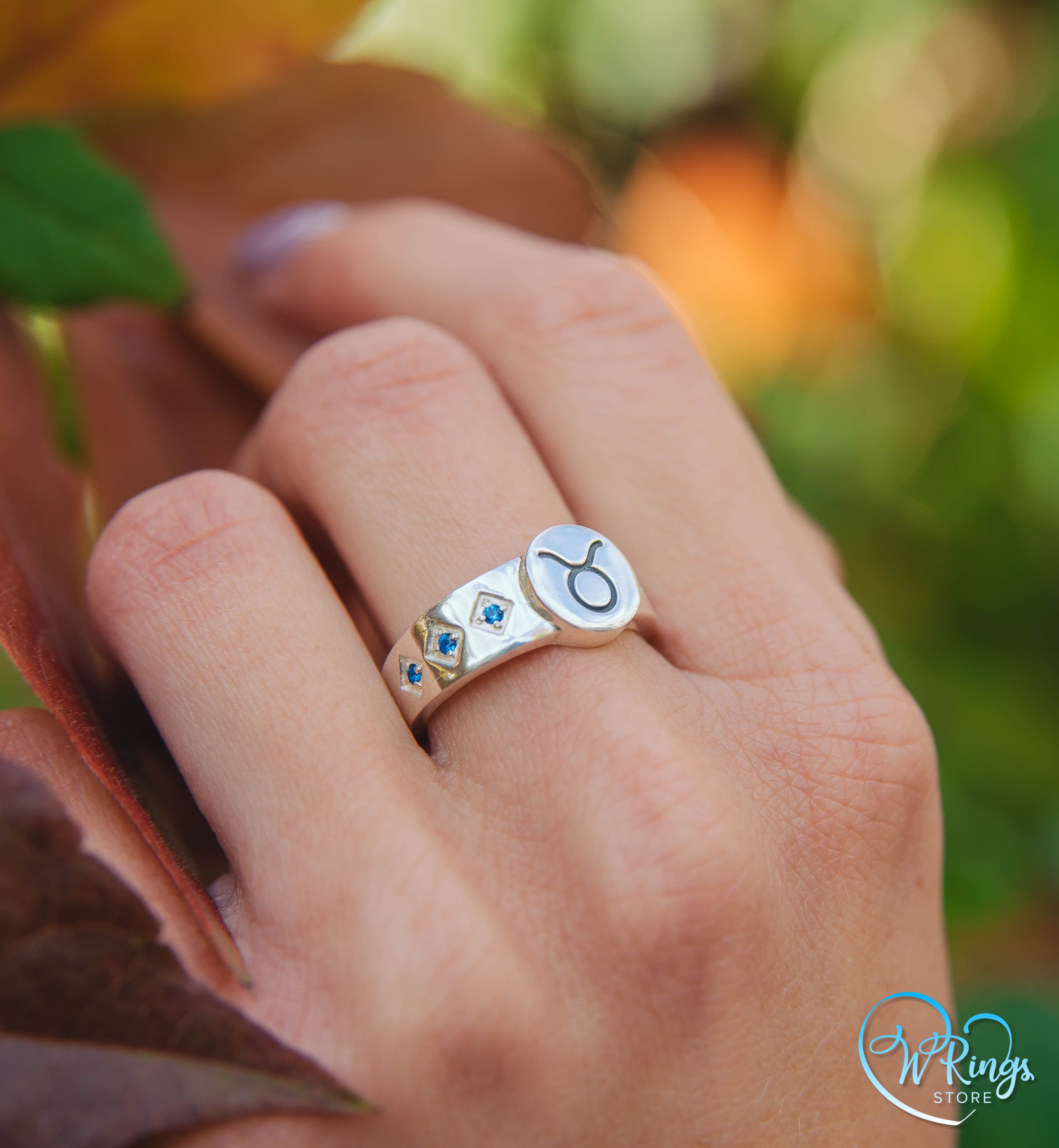 Round shape Taurus Signet Ring in Silver with side Sapphires