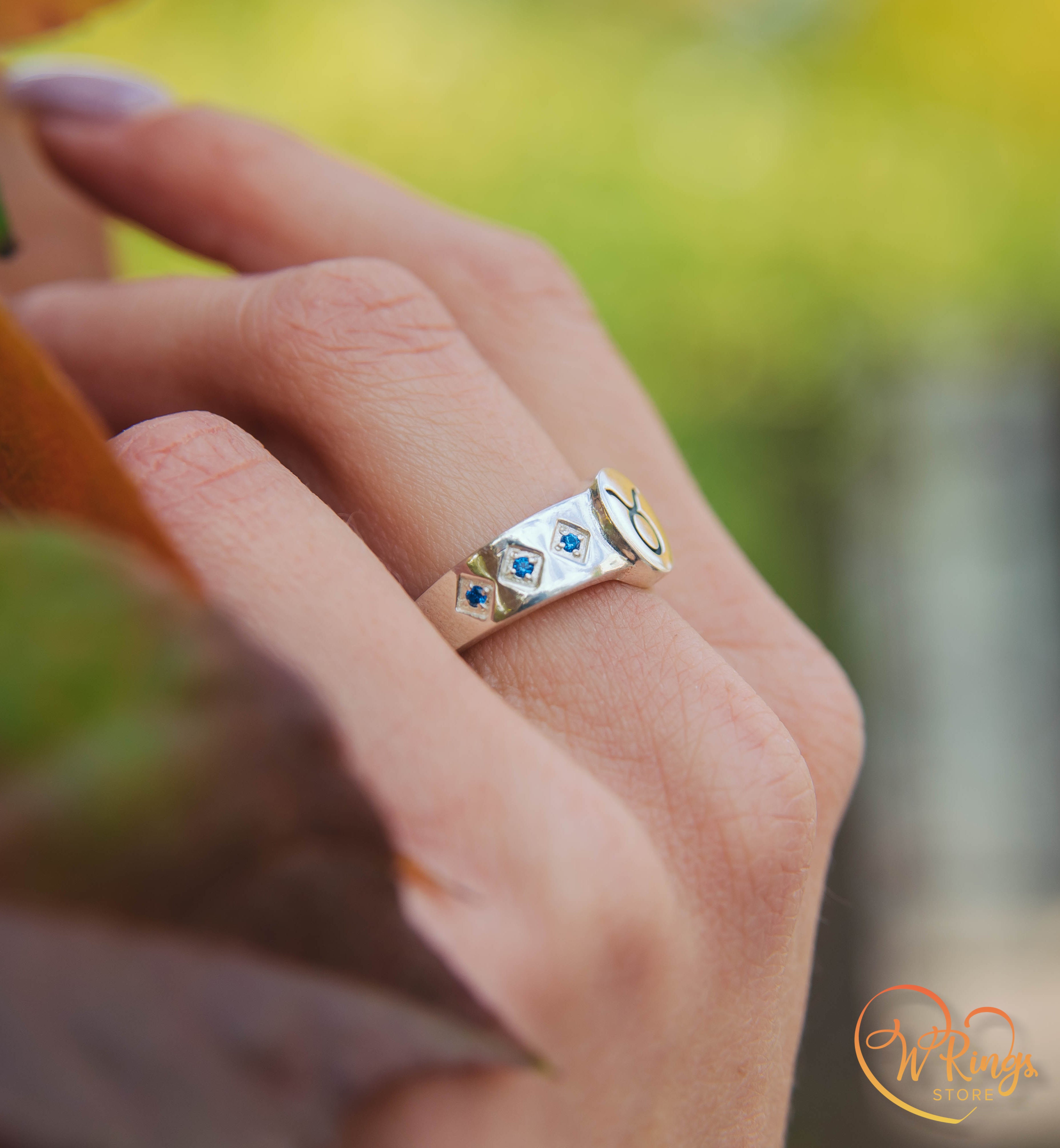 Round shape Taurus Signet Ring in Silver with side Sapphires