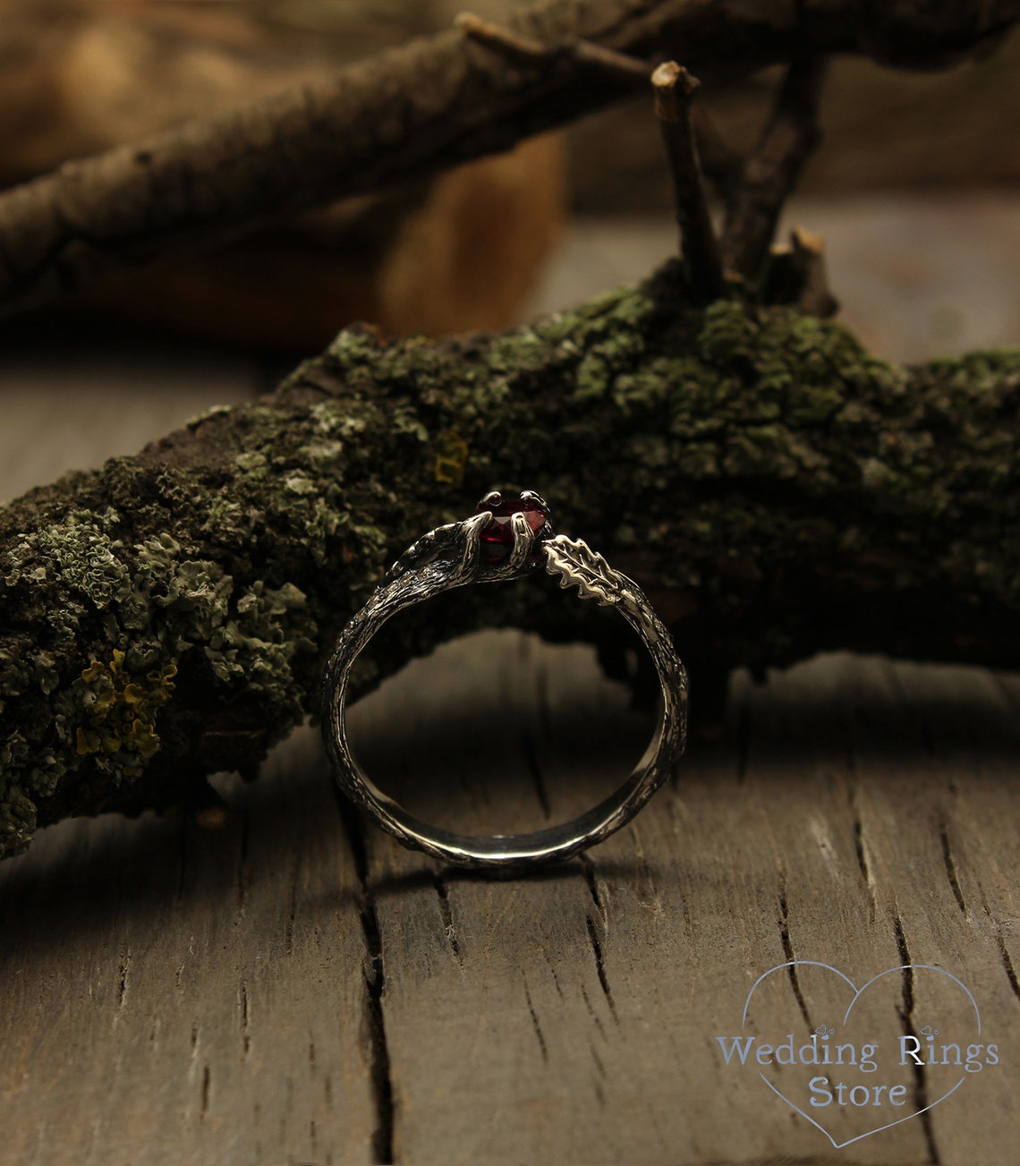 Ruby Engagement Ring with Side Stones and Oak Leaves on Twig