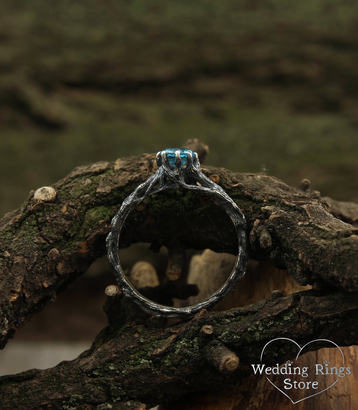 Vivid Topaz Engagement Ring with Silver Branch