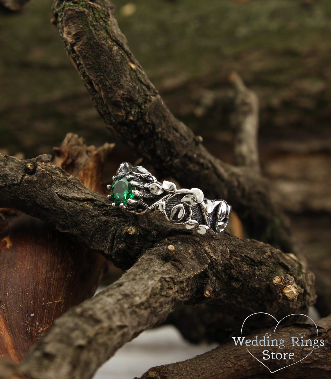 Silver Twig and many Leaves Engagement Ring with Emerald