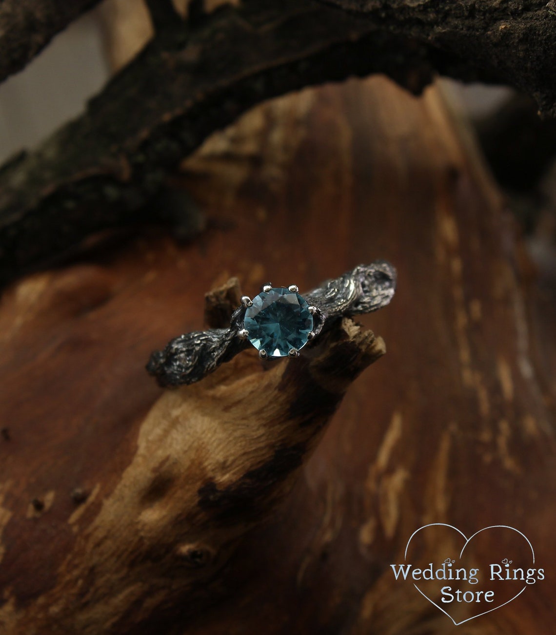 Vivid Topaz Engagement Ring with Silver Branch