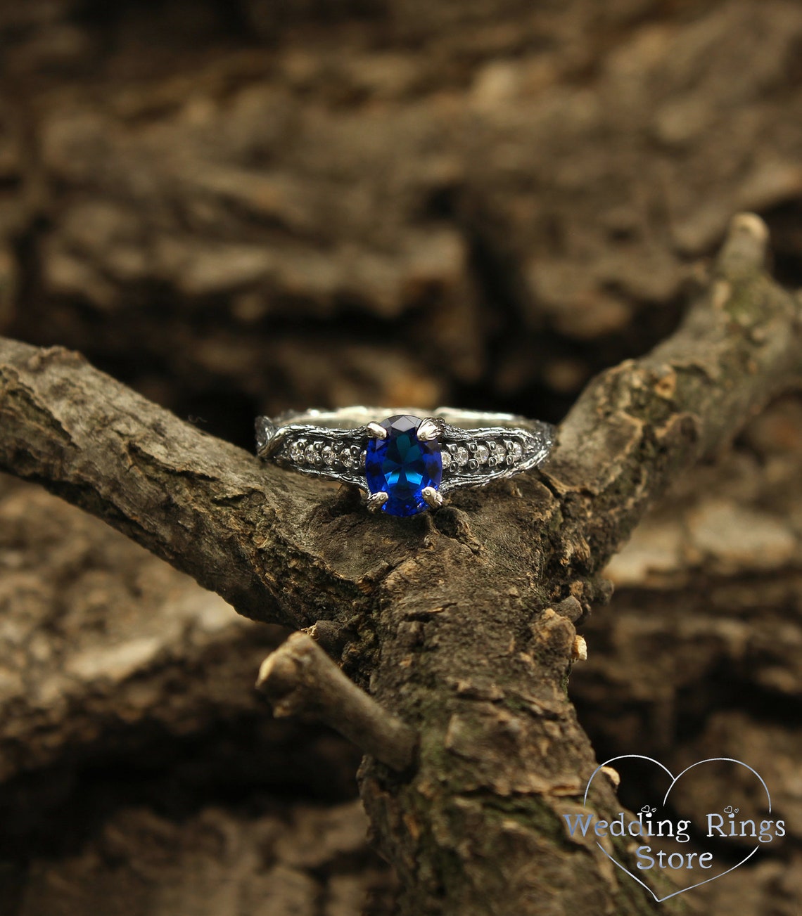 Elegant Sapphire Engagement Ring in Silver imitating Woodbark