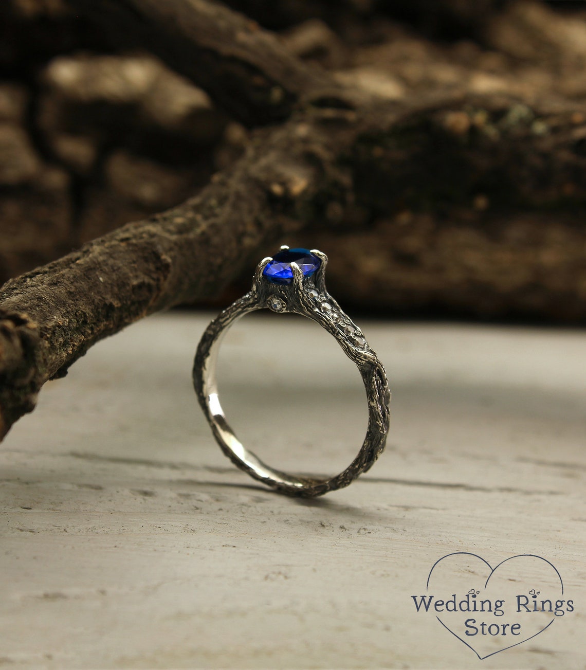 Elegant Sapphire Engagement Ring in Silver imitating Woodbark