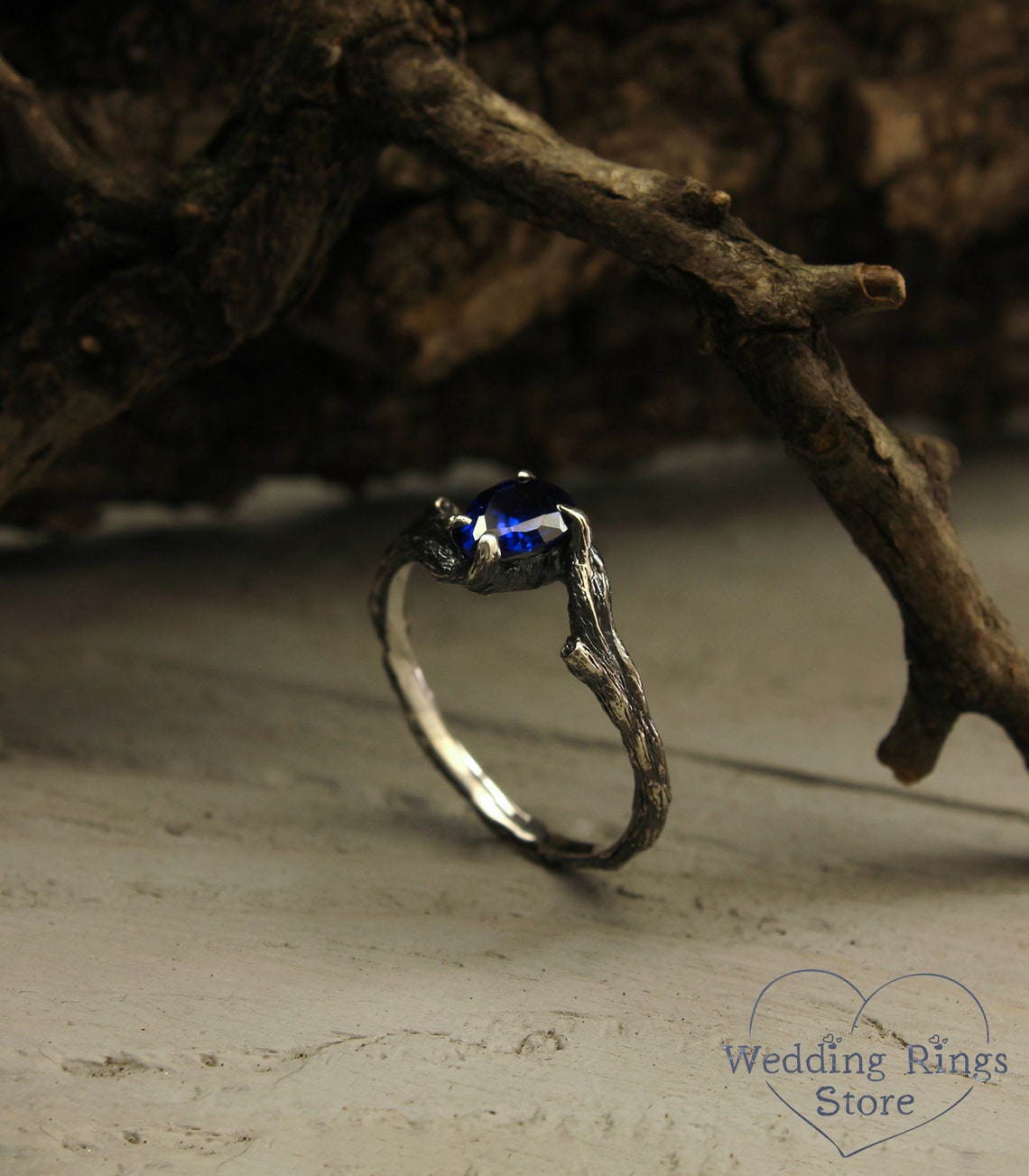 Pear cut Sapphire joins Silver Branches Engagement Ring