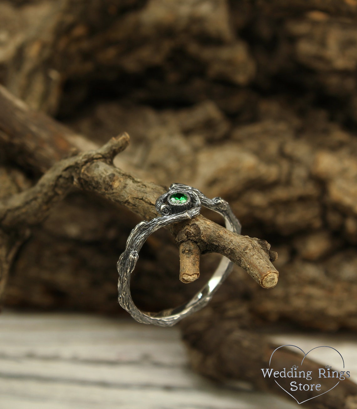 Dainty Braided Silver Twigs with Shiny Emerald inside