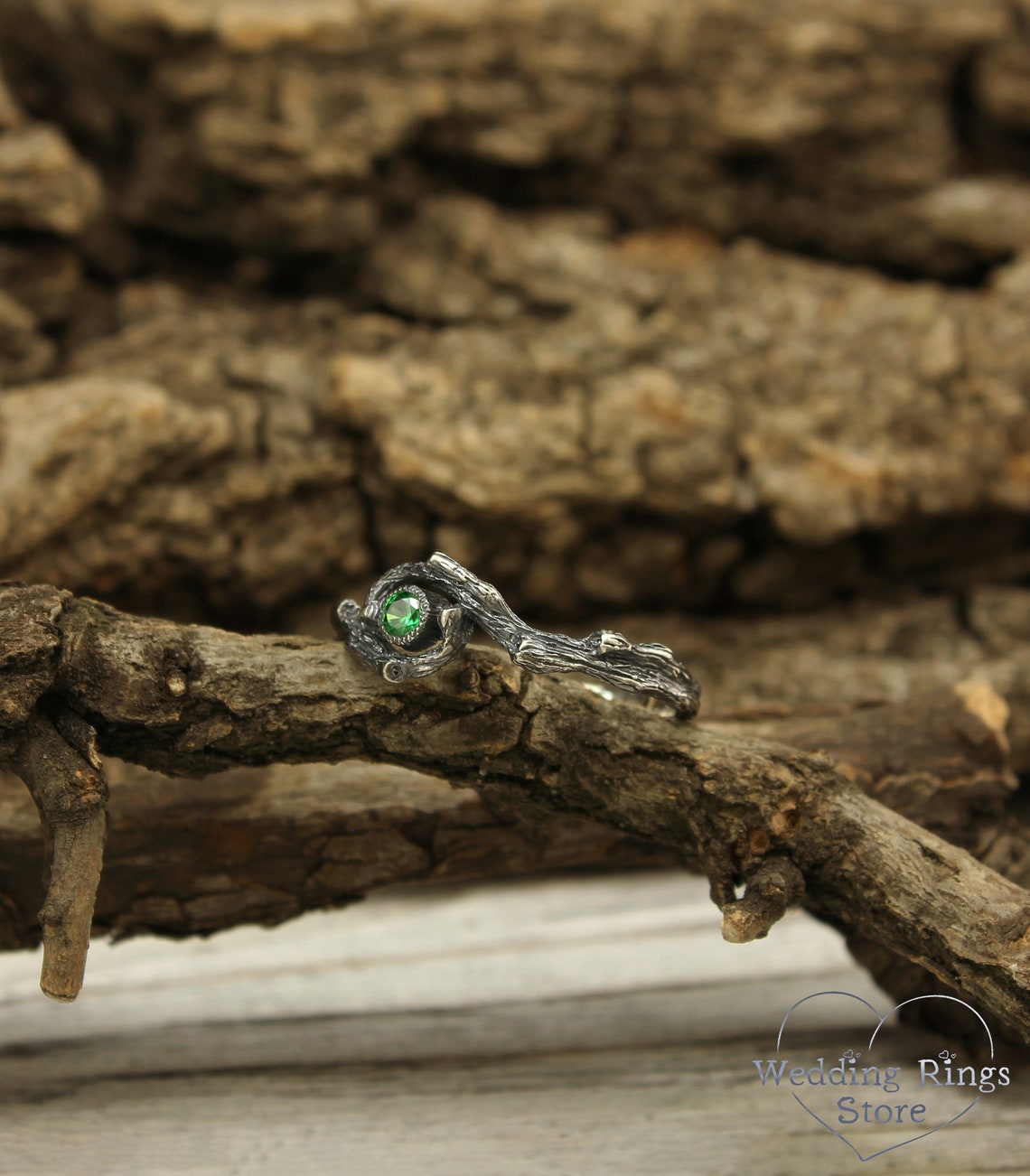 Dainty Braided Silver Twigs with Shiny Emerald inside