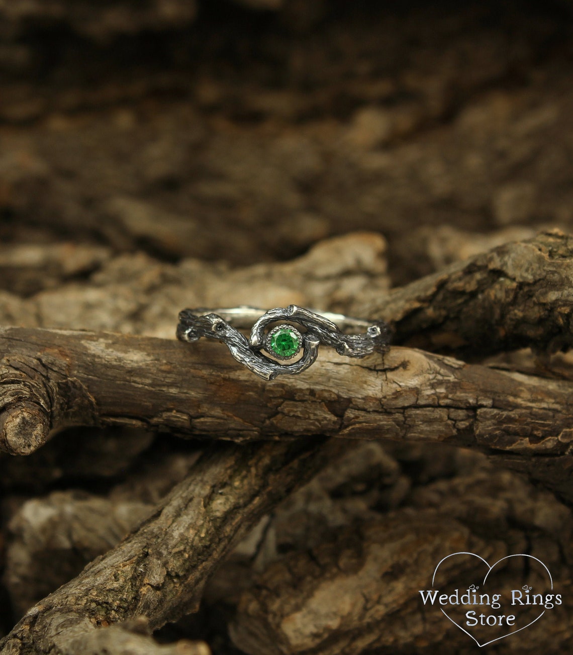 Dainty Braided Silver Twigs with Shiny Emerald inside