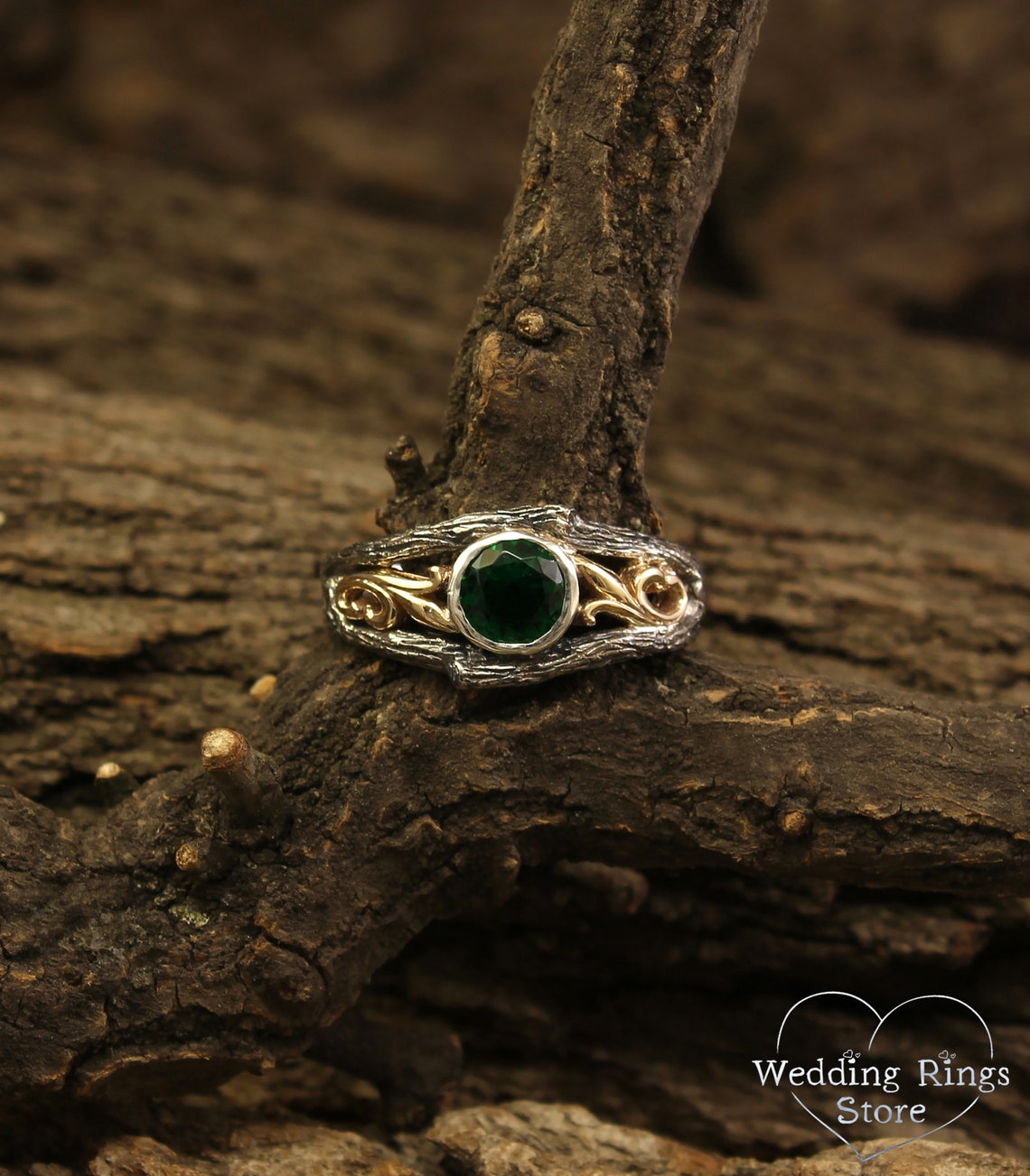 Bezel Set Emerald Ring with Gold Vines on a Silver Twig