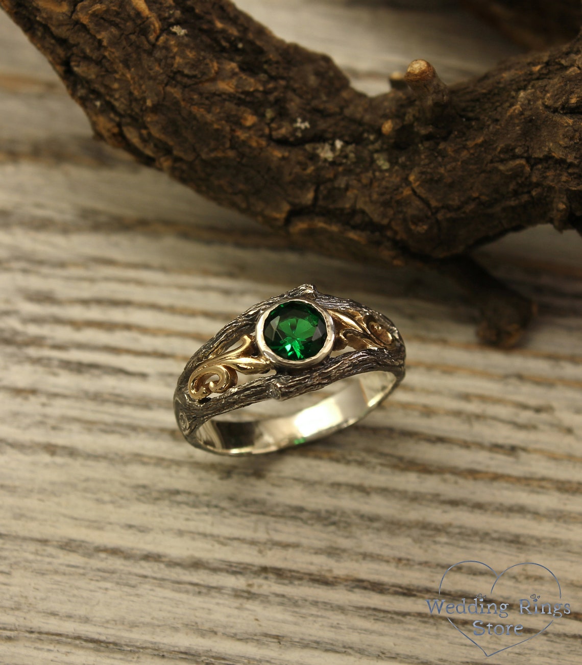 Bezel Set Emerald Ring with Gold Vines on a Silver Twig