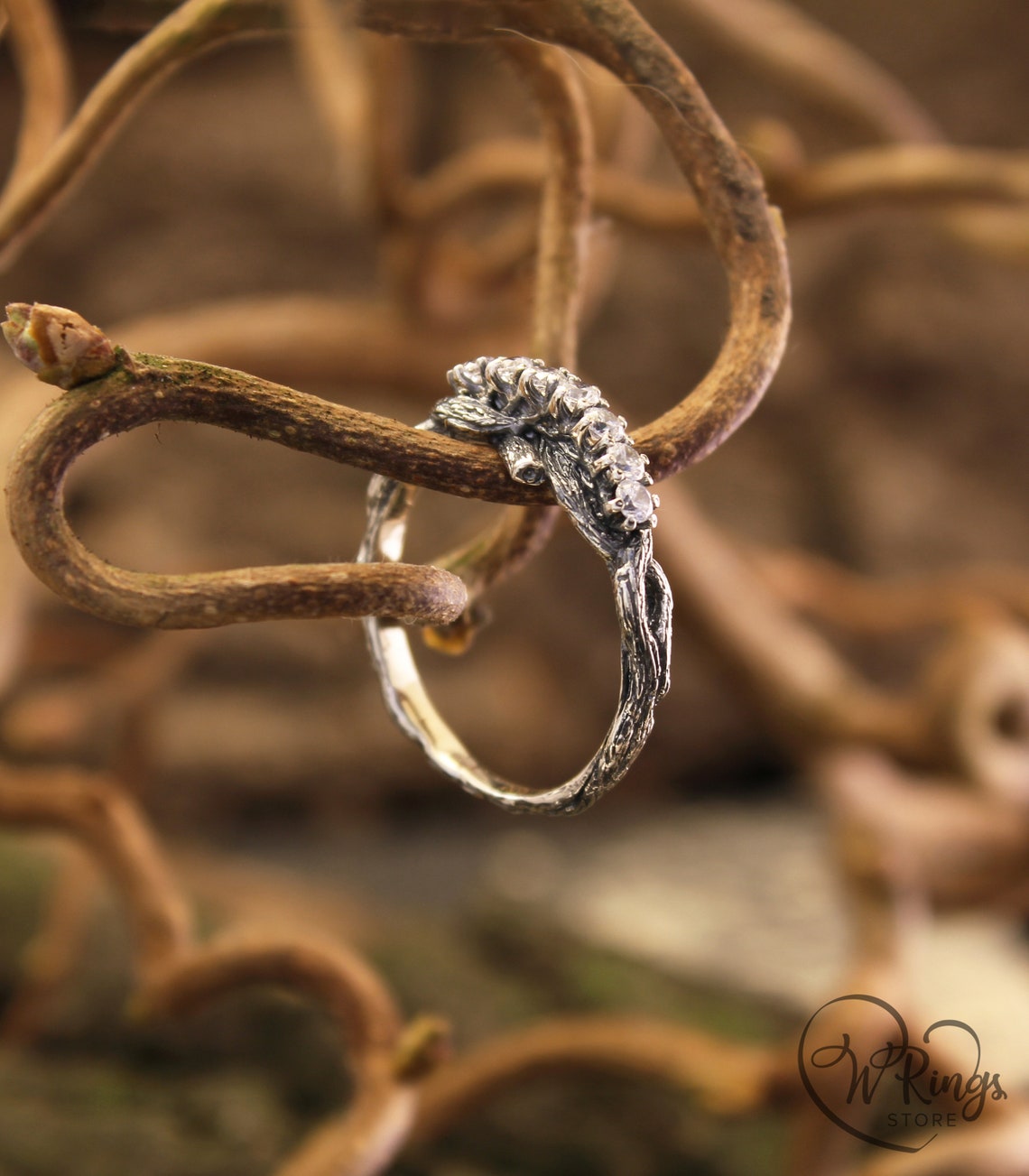 Intertwined Twig Silver Ring with Cubic Zirconia on the knots