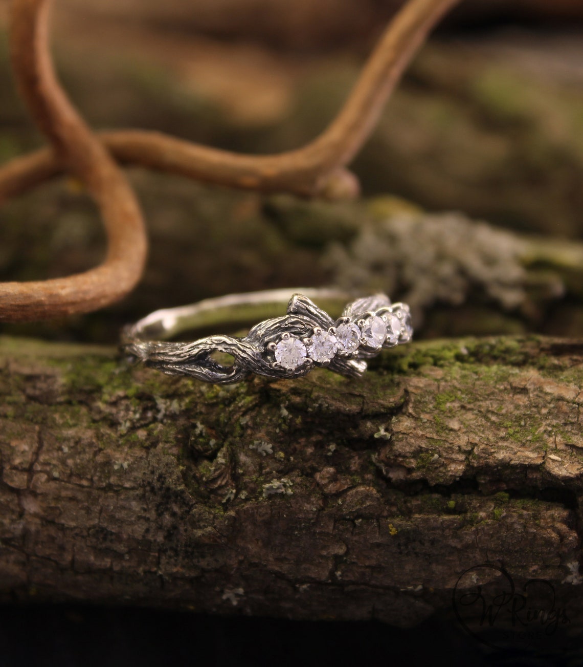 Intertwined Twig Silver Ring with Cubic Zirconia on the knots