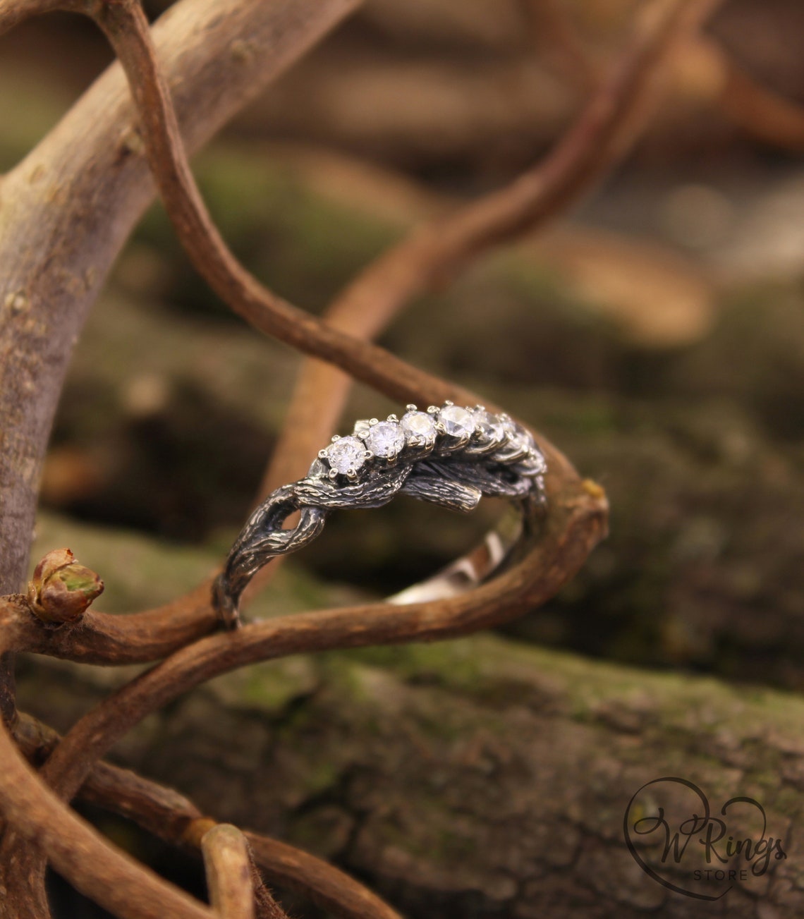 Intertwined Twig Silver Ring with Cubic Zirconia on the knots