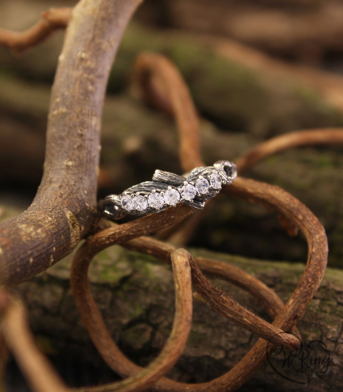 Intertwined Twig Silver Ring with Cubic Zirconia on the knots