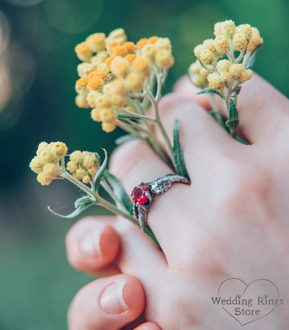 Ruby Engagement Ring with Side Stones and Oak Leaves on Twig