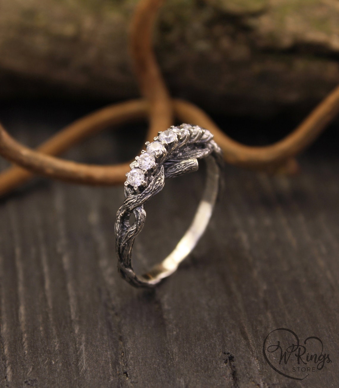 Intertwined Twig Silver Ring with Cubic Zirconia on the knots