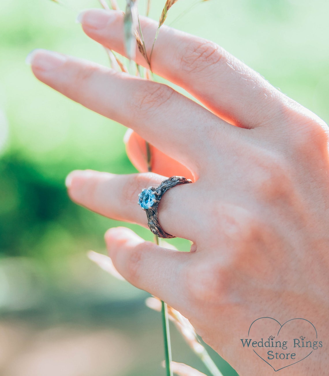 Vivid Topaz Engagement Ring with Silver Branch