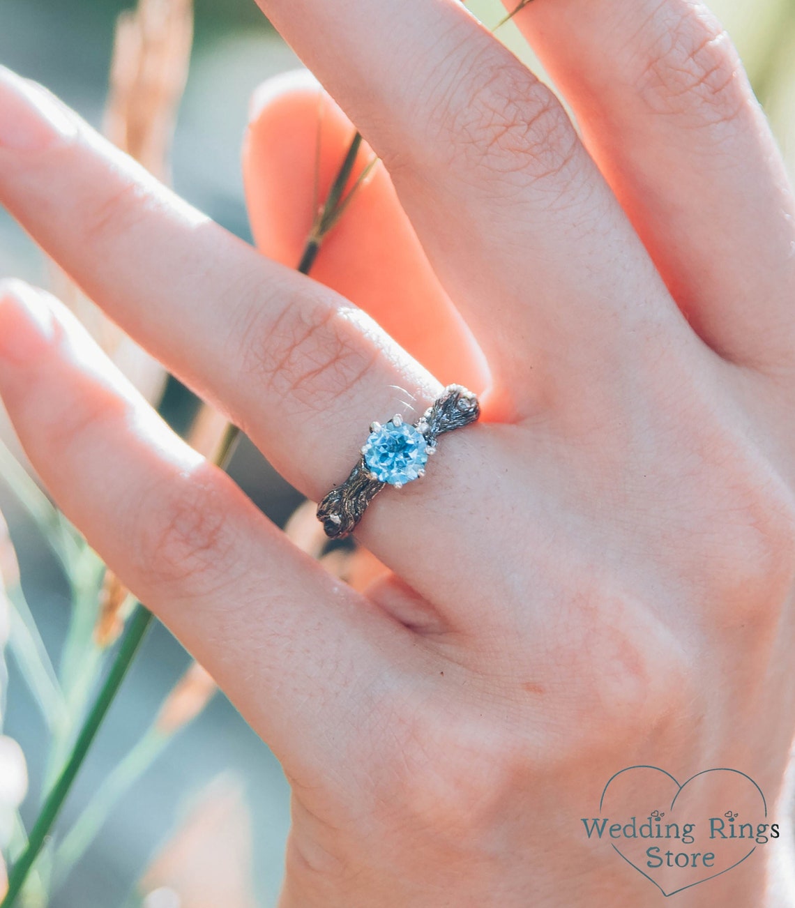 Vivid Topaz Engagement Ring with Silver Branch