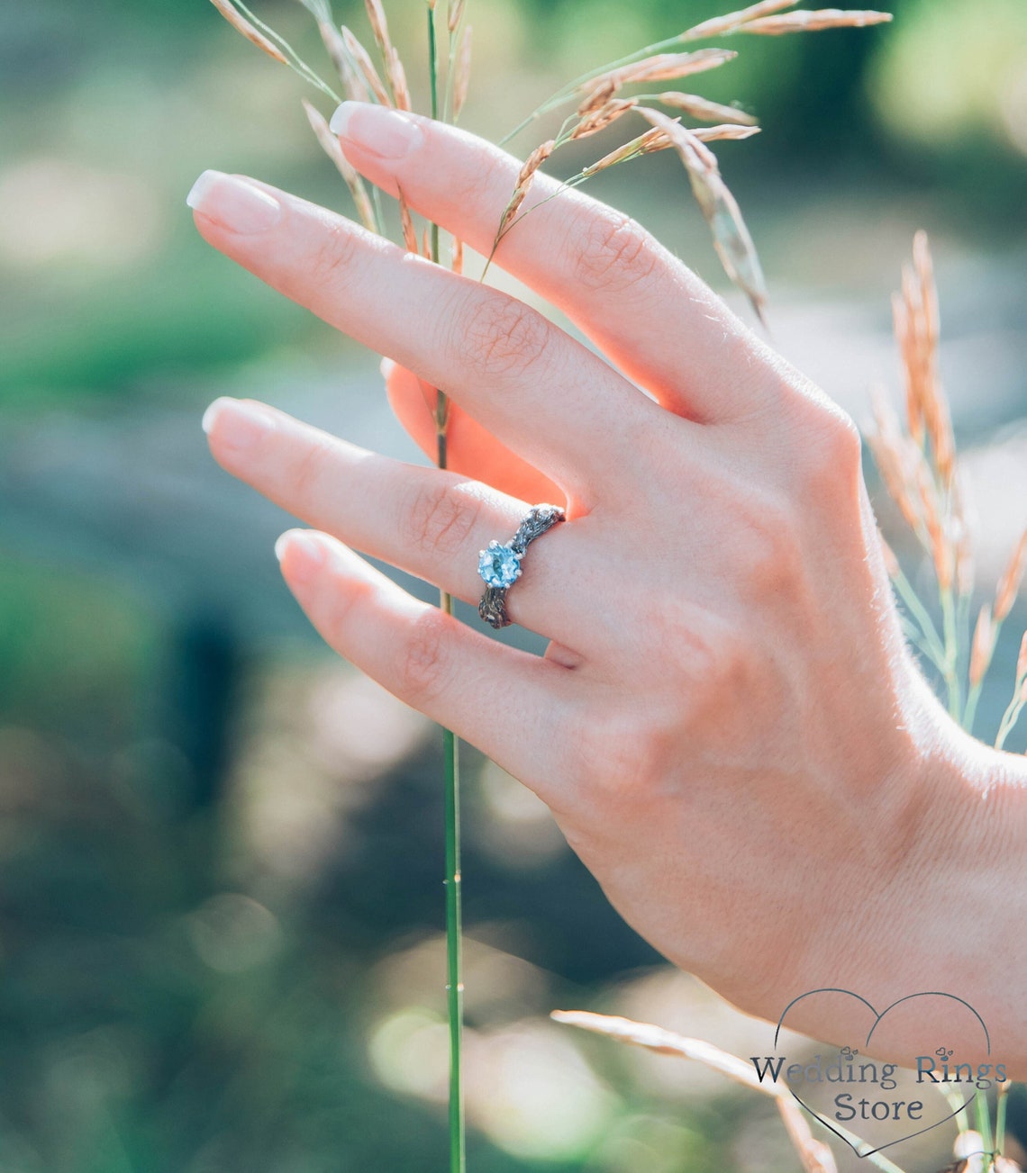 Vivid Topaz Engagement Ring with Silver Branch