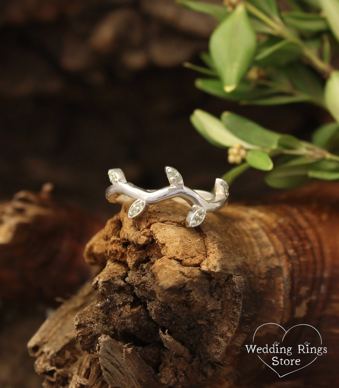 Thin Wave Twig Ring with Delicate Leaves of Natural Peridot