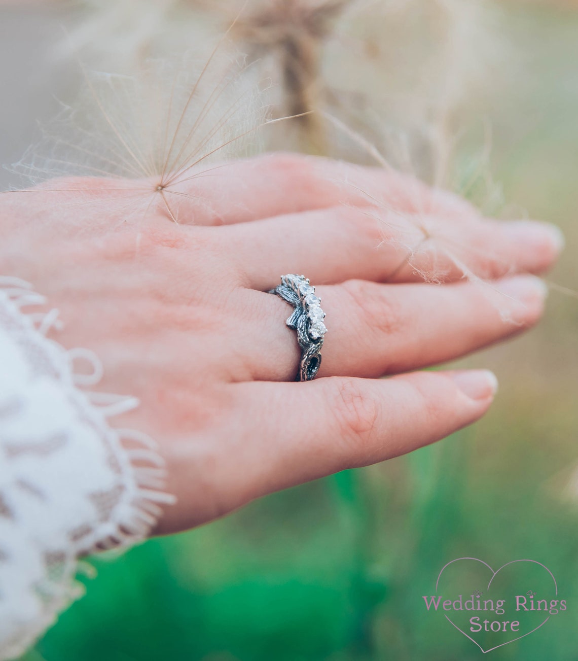 Intertwined Twig Silver Ring with Cubic Zirconia on the knots