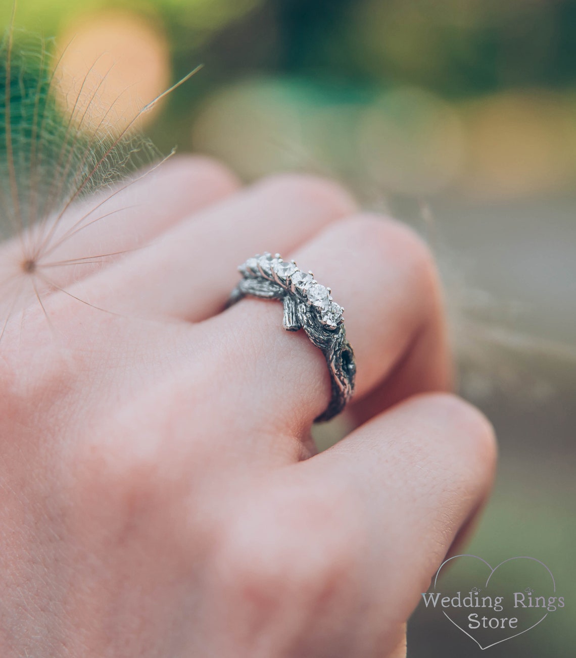 Intertwined Twig Silver Ring with Cubic Zirconia on the knots