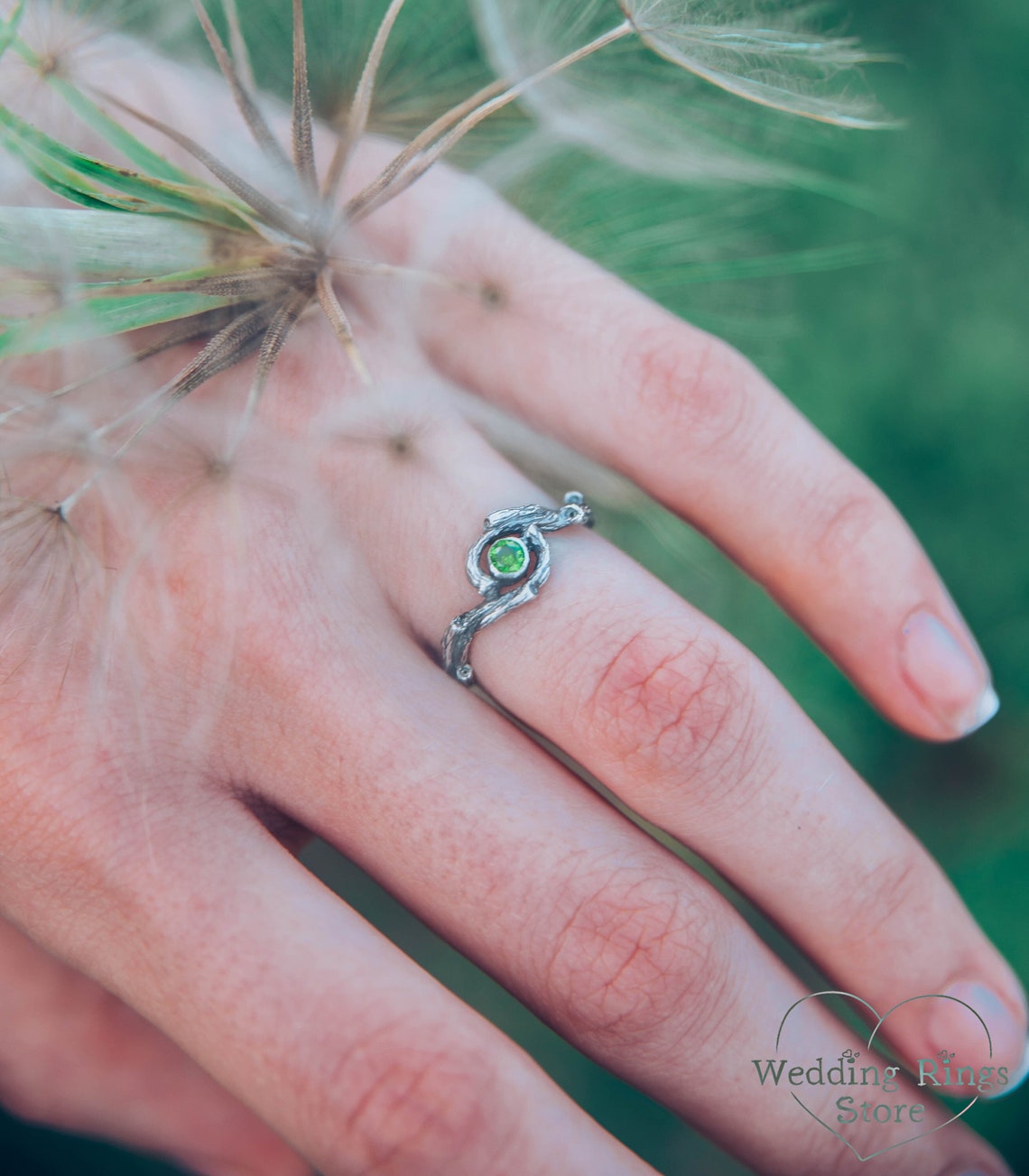 Dainty Braided Silver Twigs with Shiny Emerald inside