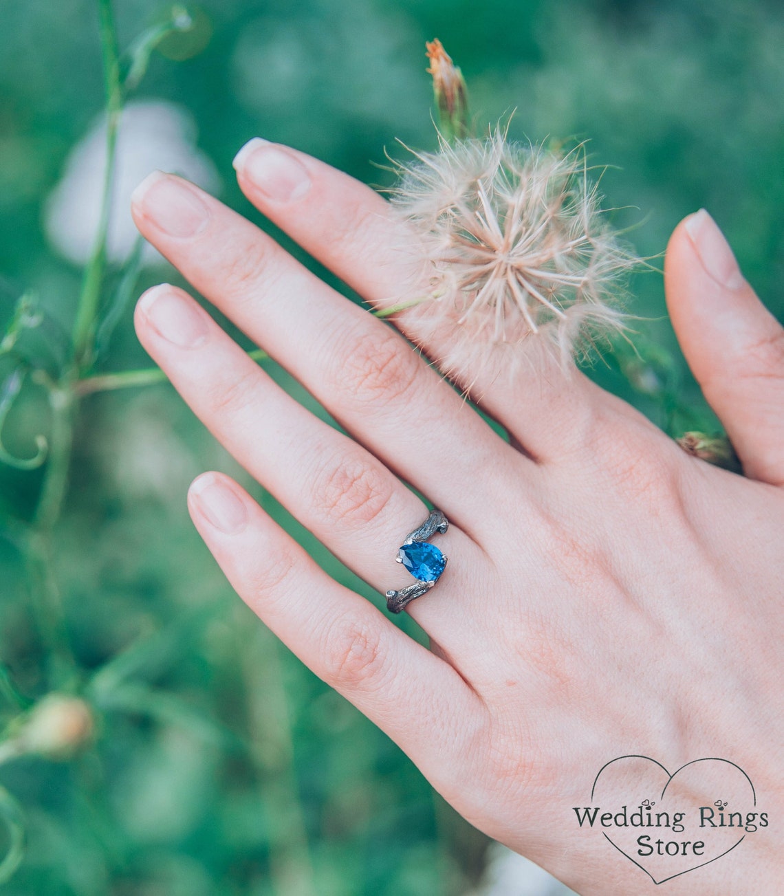 Pear cut Sapphire joins Silver Branches Engagement Ring