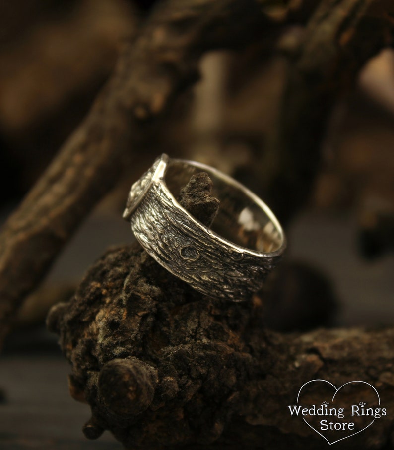 Unique Solid Silver Lion head Ring for Men placed in a Shield