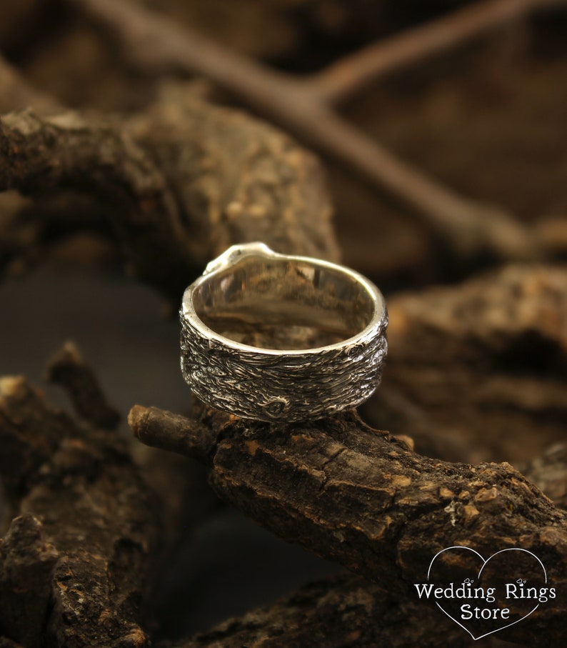 Unique Solid Silver Lion head Ring for Men placed in a Shield