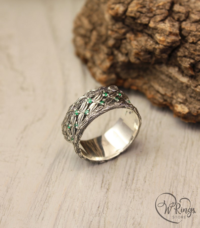 Silver Leaves and Branch Statement Wedding Band with Emeralds