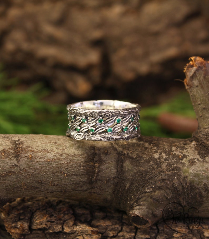 Silver Leaves and Branch Statement Wedding Band with Emeralds