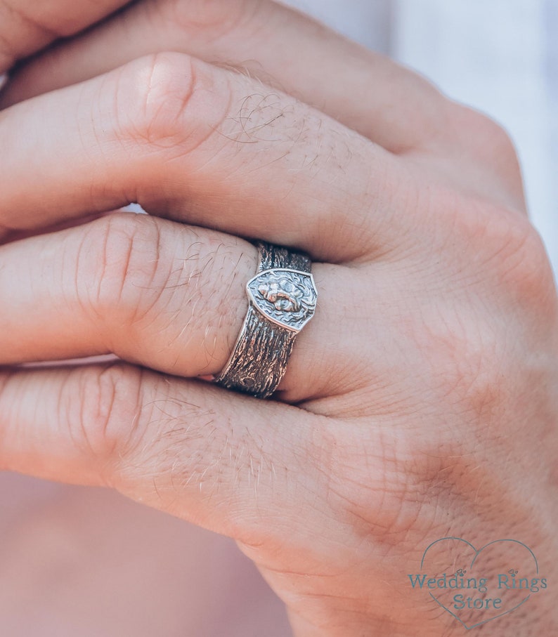 Unique Solid Silver Lion head Ring for Men placed in a Shield