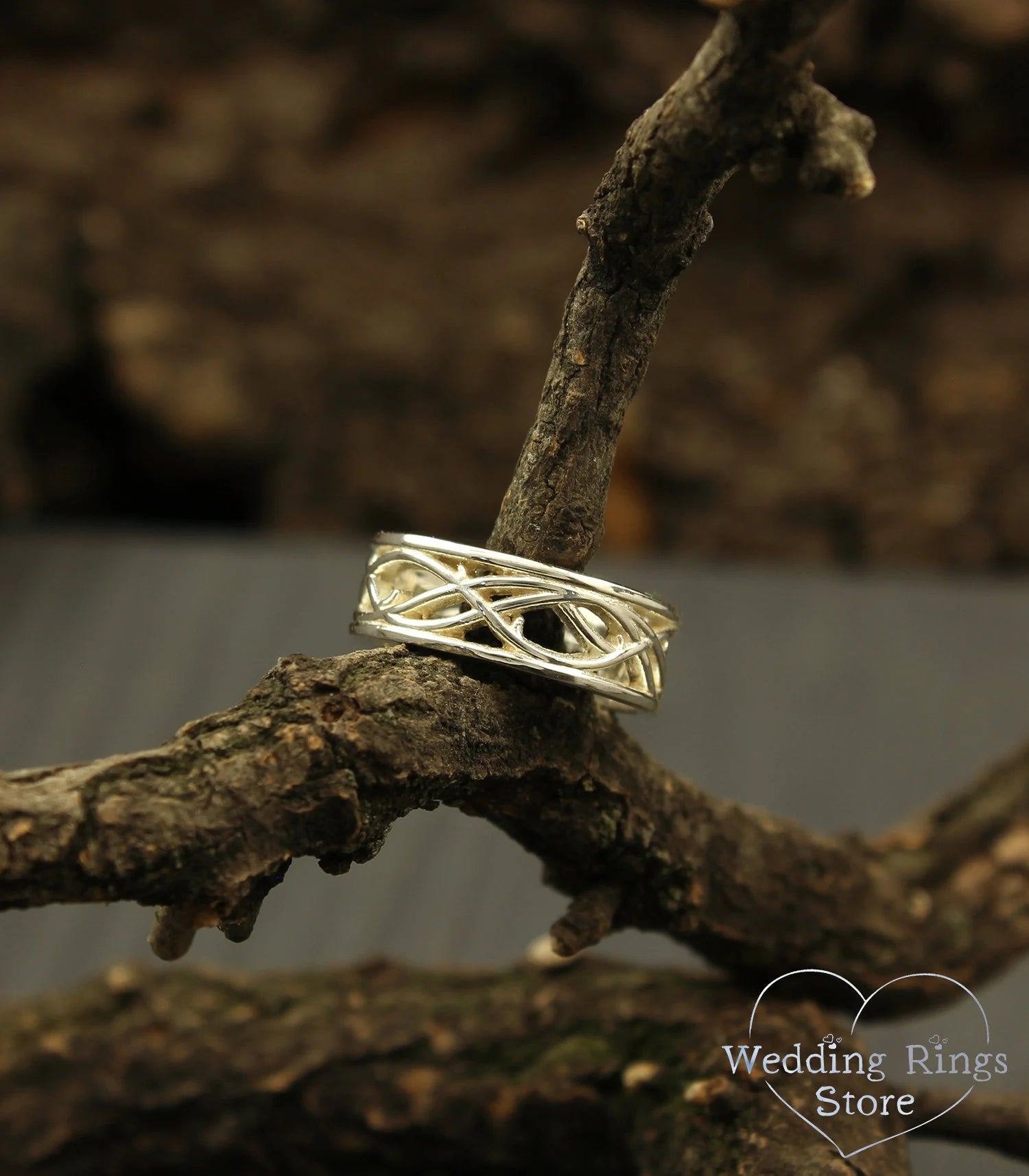 Elegant Silver Braided Wedding Band with open twisted pattern