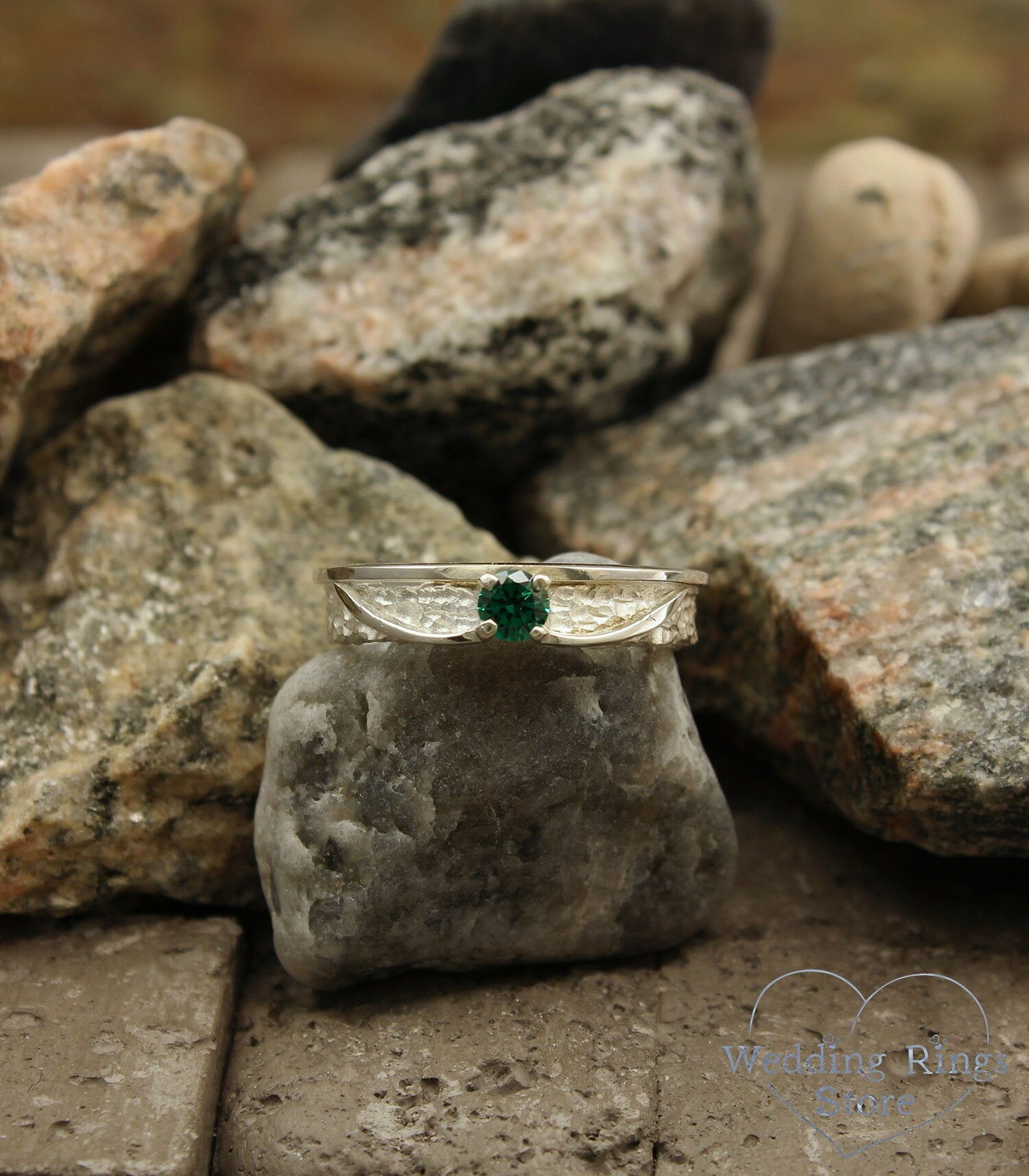 Avant garde Silver Hammered Engagement Ring with Emerald