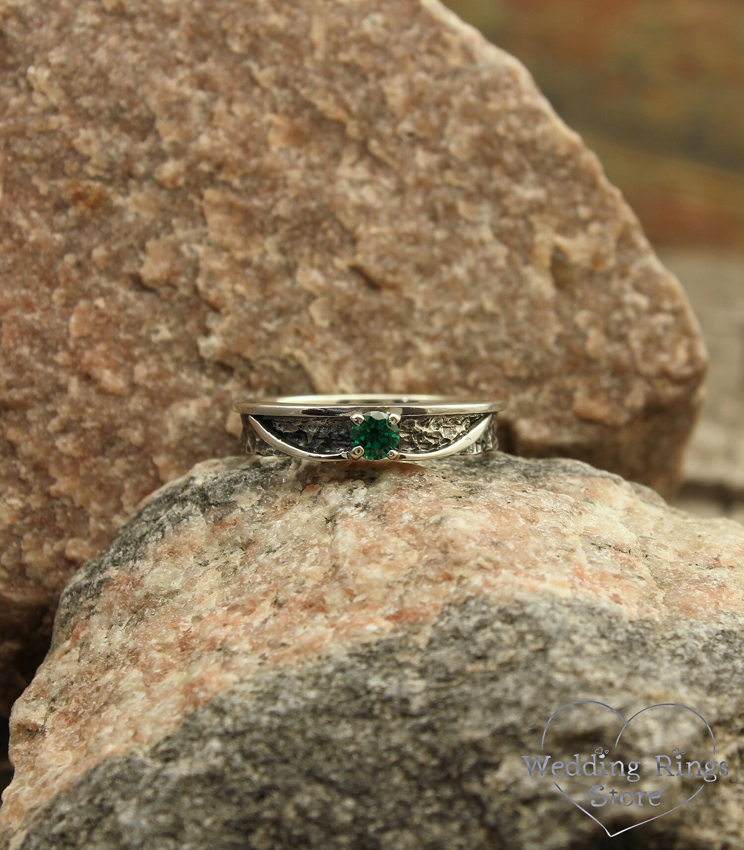 Avant garde Silver Hammered Engagement Ring with Emerald