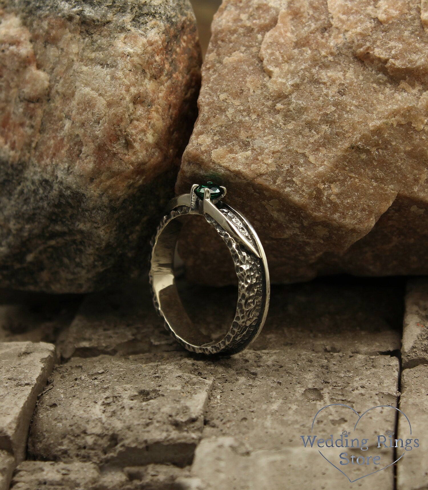 Avant garde Silver Hammered Engagement Ring with Emerald