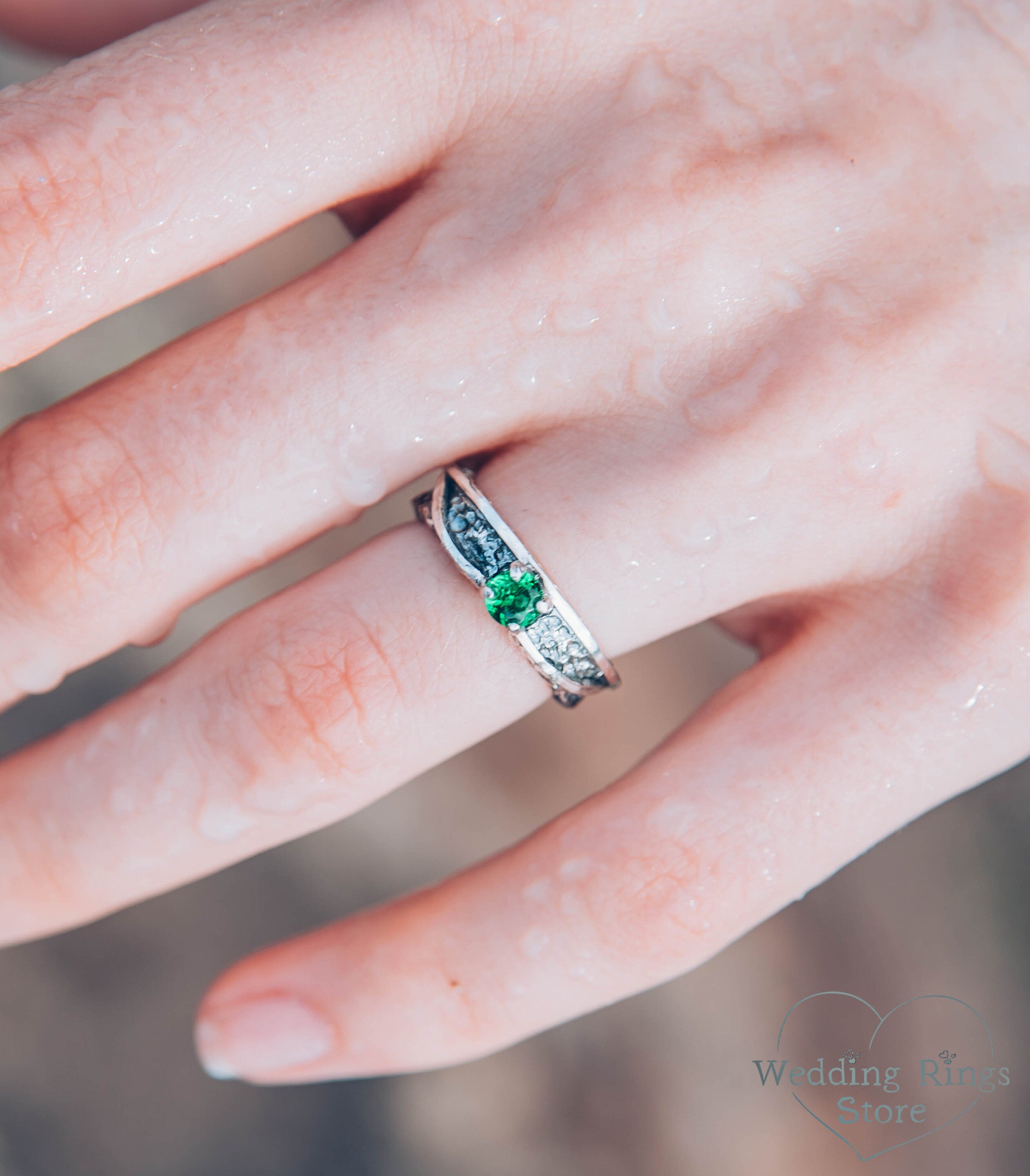 Avant garde Silver Hammered Engagement Ring with Emerald