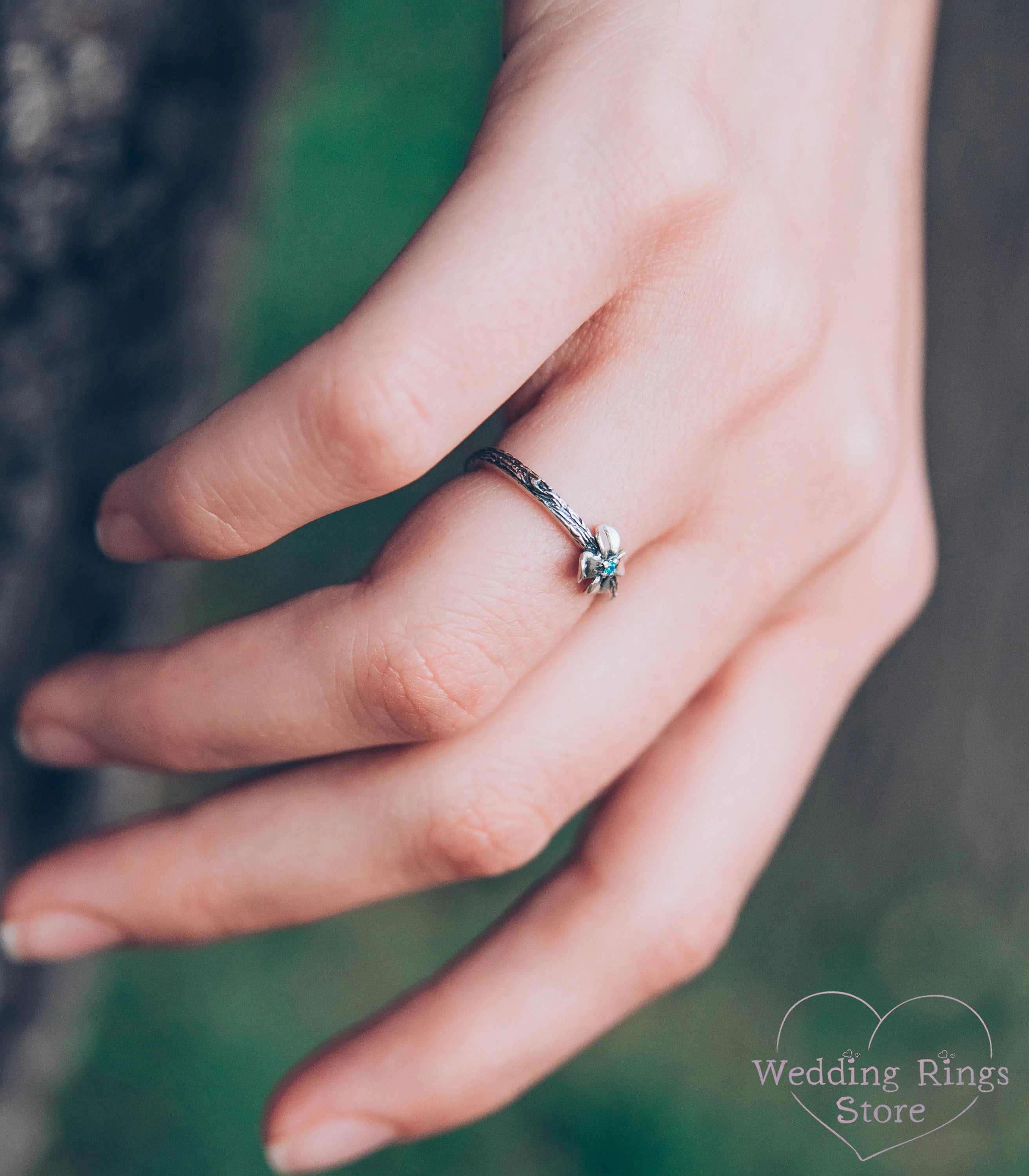 Dainty Flower Ring with Swiss Topaz on tiny Silver Branch