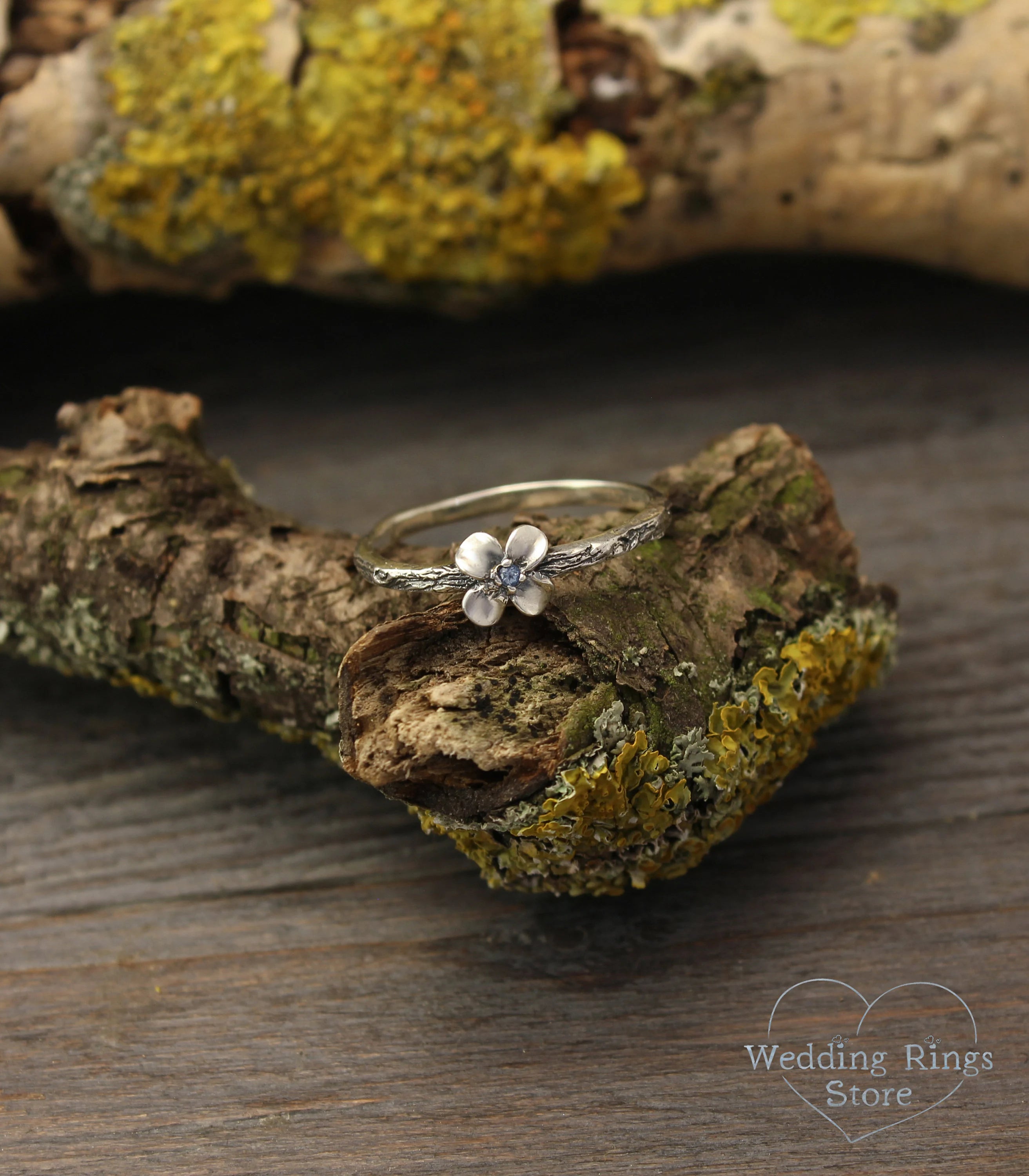 Dainty Flower Ring with Swiss Topaz on tiny Silver Branch