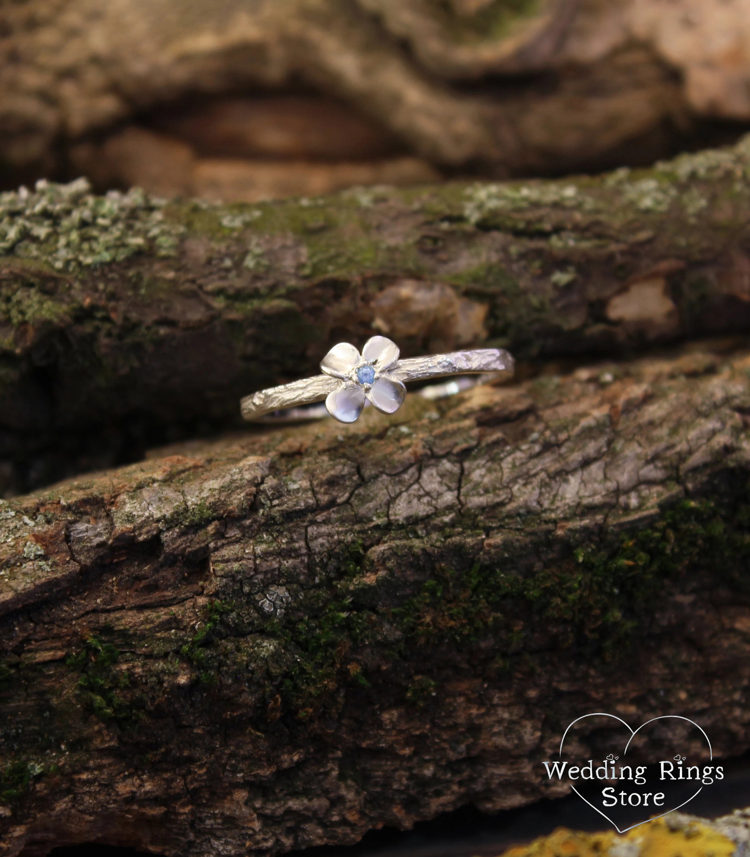 Dainty Flower Ring with Swiss Topaz on tiny Silver Branch