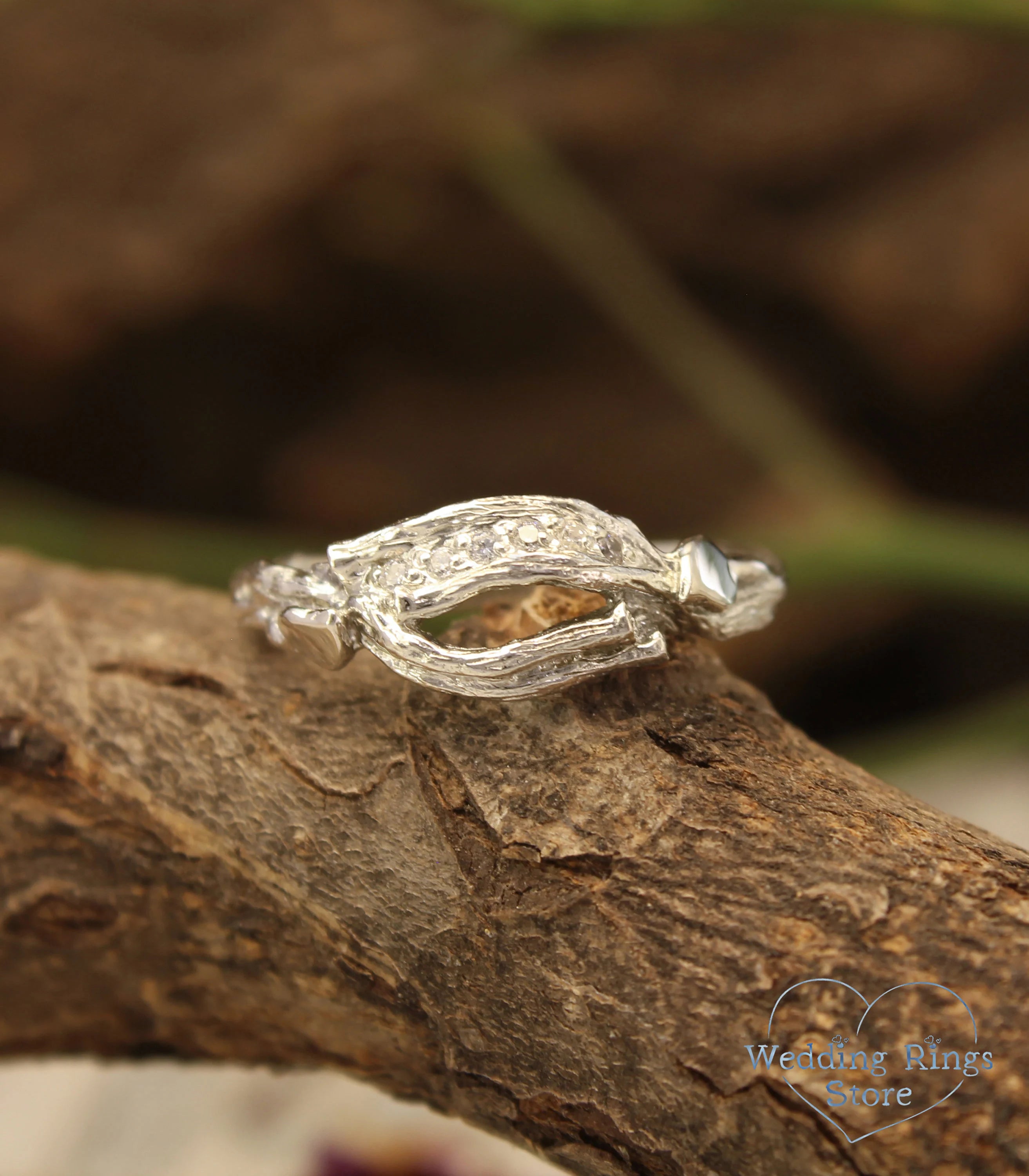 Silver Elvish Ring with shiny Leaves and Branch adorned with Gems