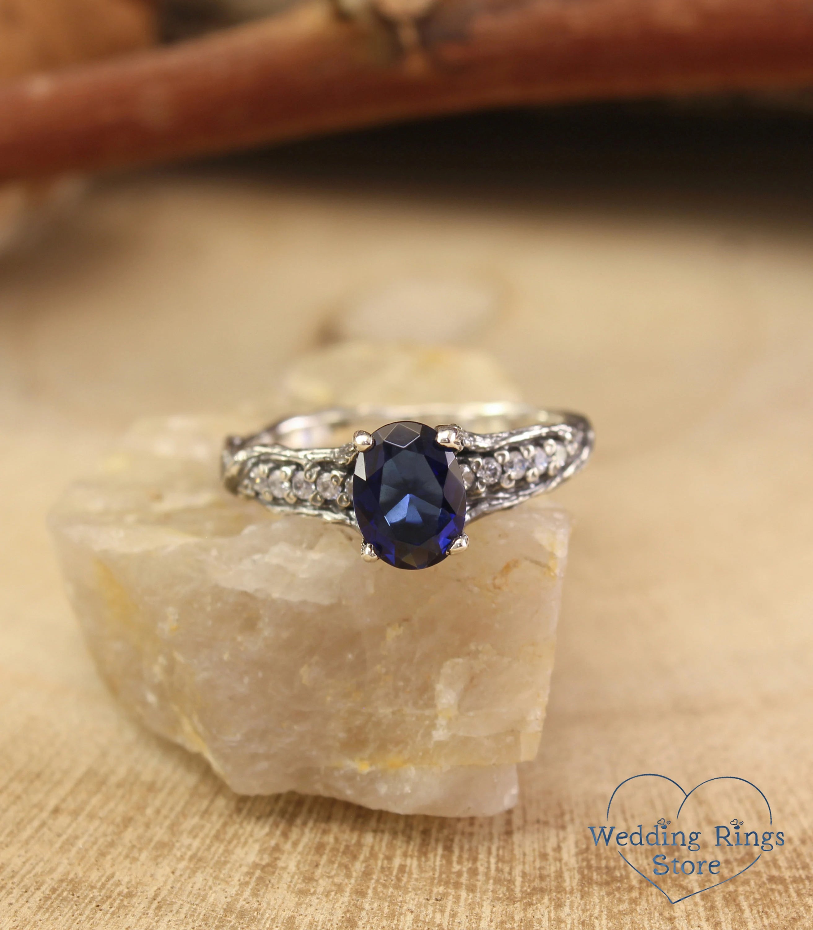 Dainty Oval Sapphire Ring – Side Stones on Silver Branch