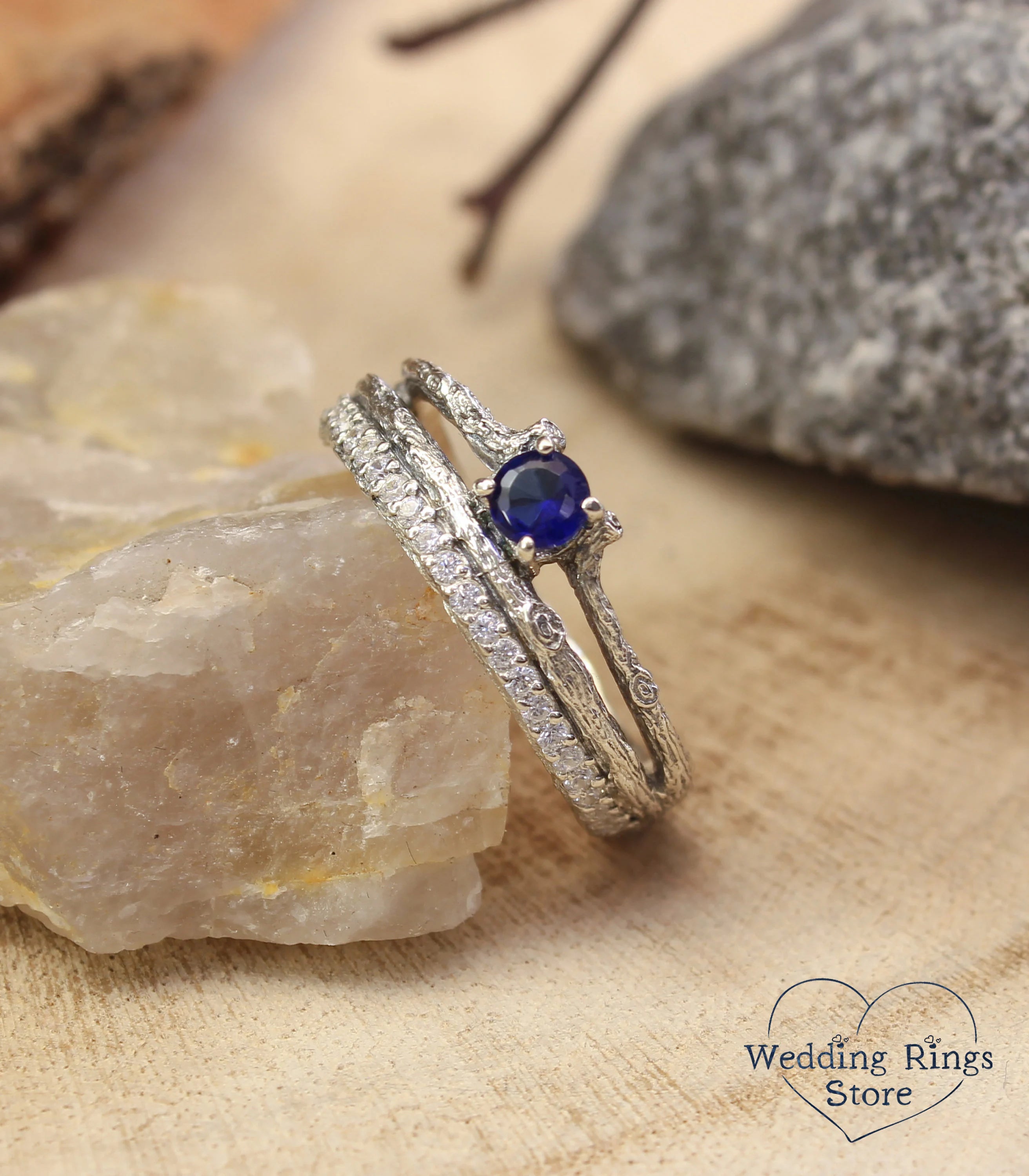 Split shank Silver Sapphire Engagement Ring with Side Stones on Twig