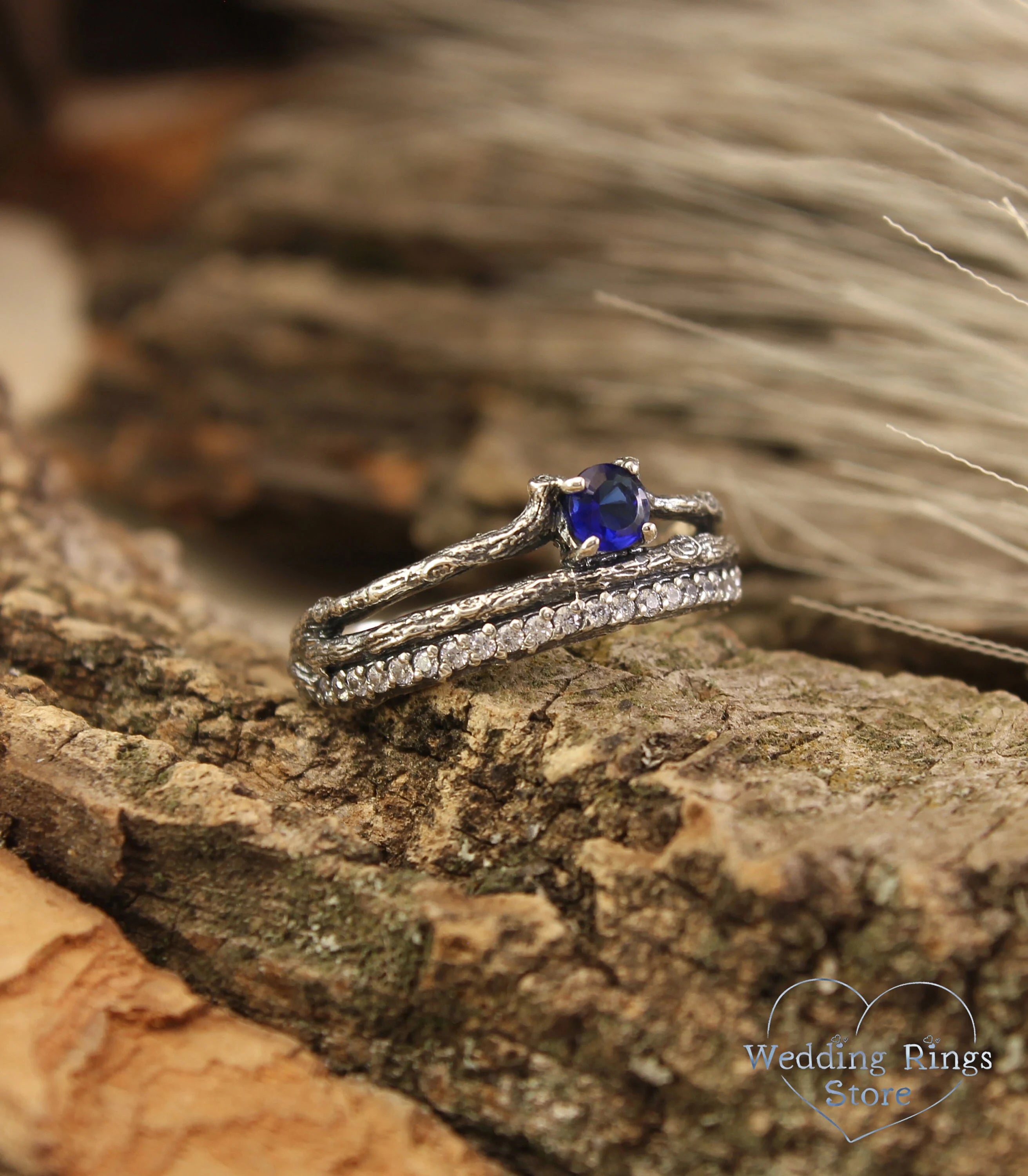 Split shank Silver Sapphire Engagement Ring with Side Stones on Twig