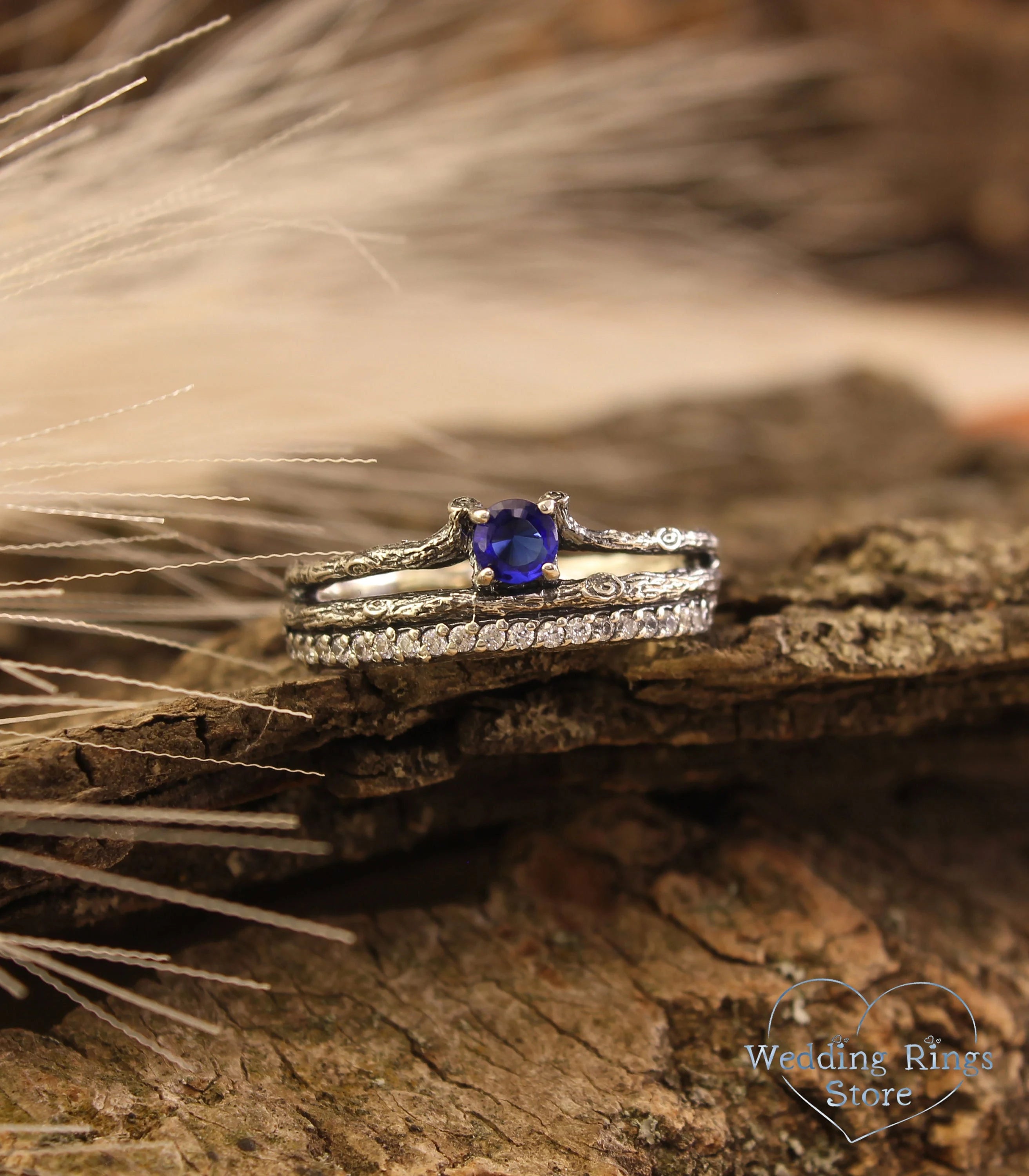 Split shank Silver Sapphire Engagement Ring with Side Stones on Twig